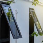 Aluminium casement window on grey wall image