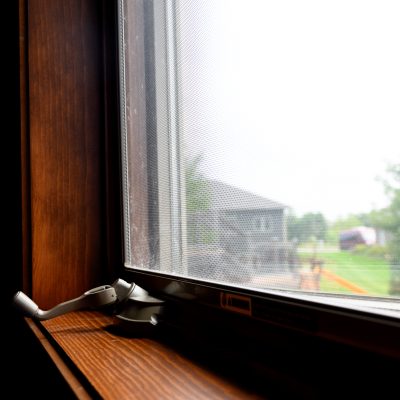 Dark brown traditional casement window